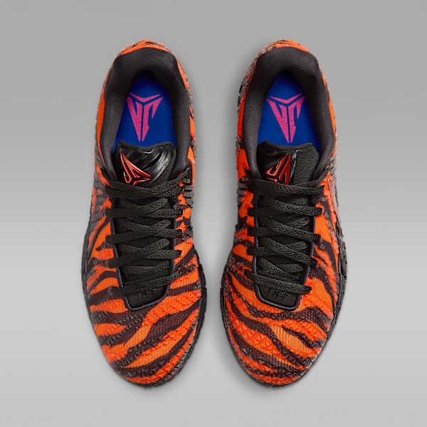 Nike JA 3 Tiger sneakers top view showing orange and black tiger stripe design